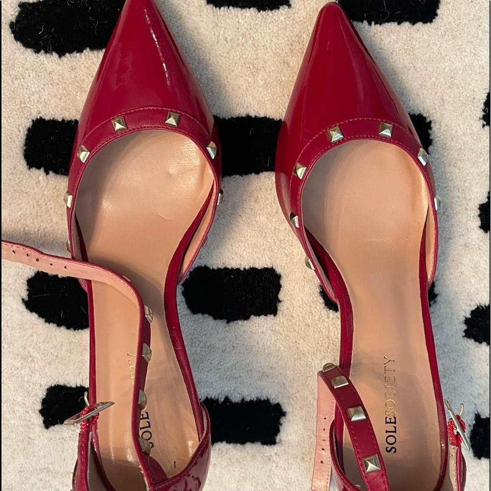 Red patent leather studded pump